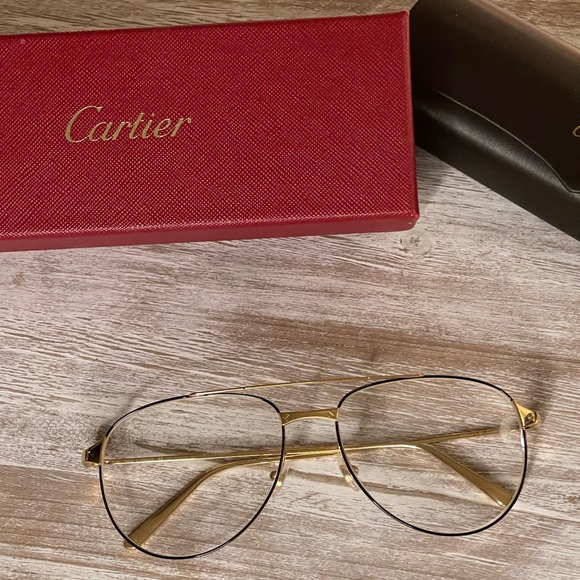 Cartiergold/black aviator.